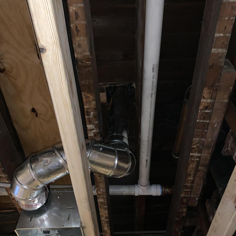 Galvanized steel bathroom exhaust vent piping installation
