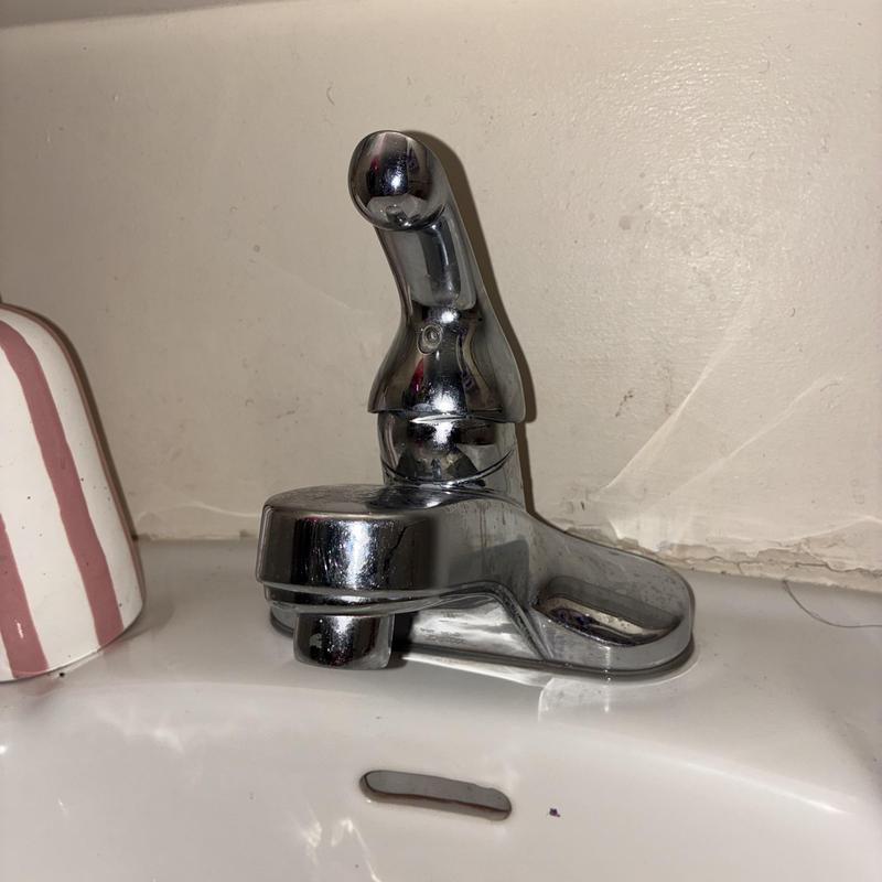 Delta basin faucet with replaced seats and springs