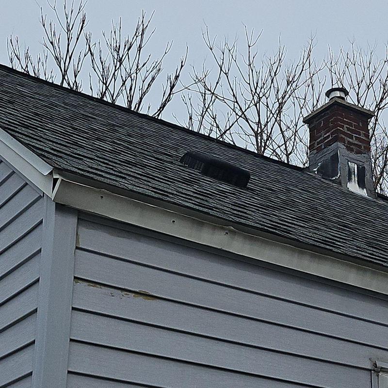 Fascia metal panel displaced by ice dam on roof edge Fascia metal panel displaced by ice dam on roof edge