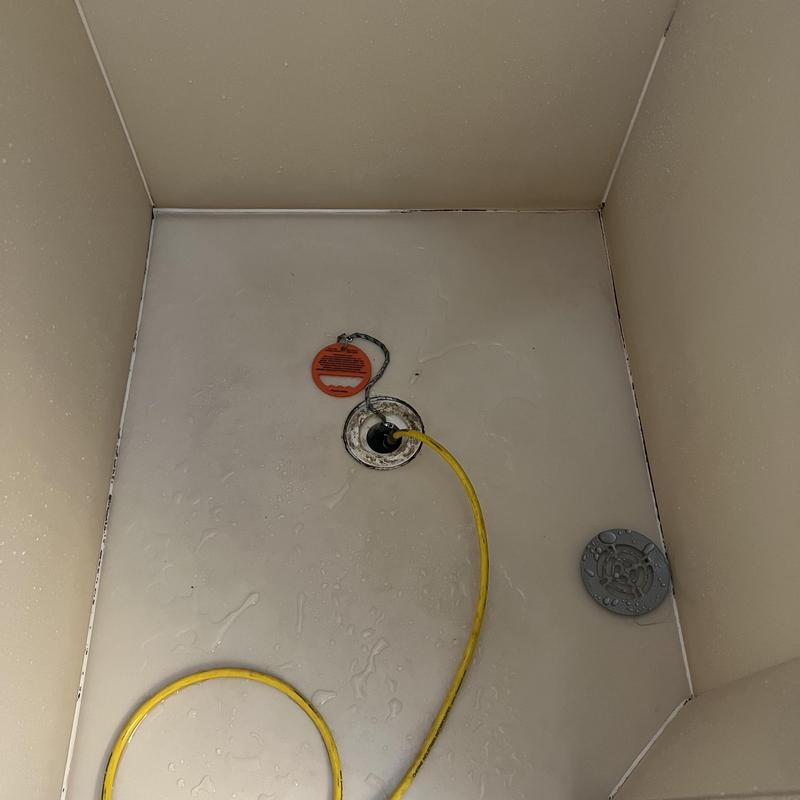 Sewer line hydrostatic test setup with yellow hose