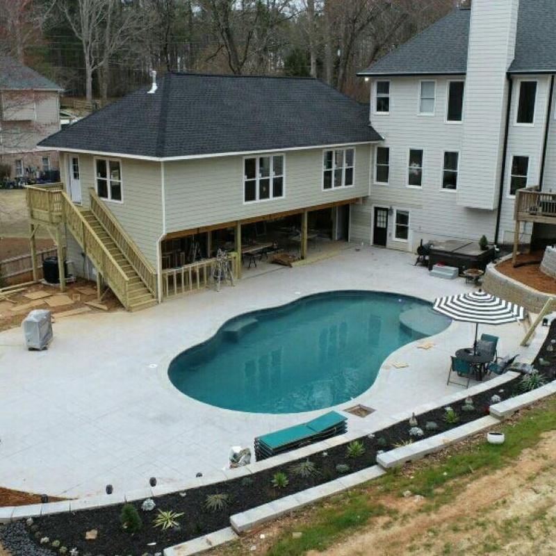 New roof on house addition with pool view