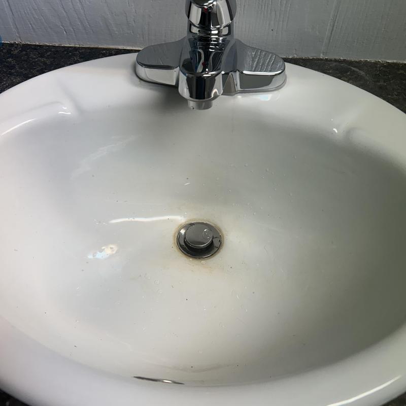 Laboratory faucet and sink drain with stopper