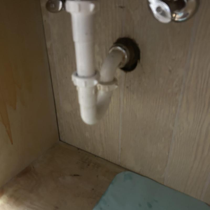 Laboratory faucet P-trap drain pipe under sink