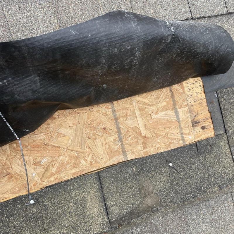 Roof decking replacement with synthetic underlayment exposed