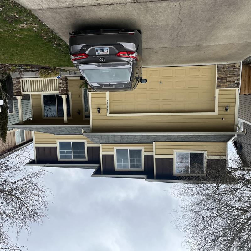 Asphalt shingle roof inspection on two-story house Asphalt shingle roof inspection on two-story house