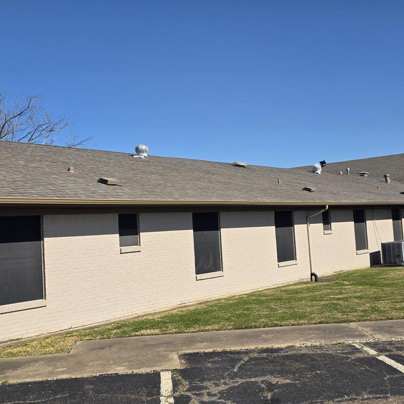 Asphalt shingle roof with hail damage inspection