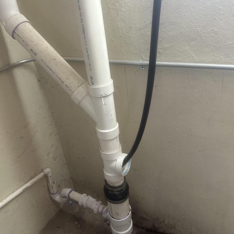 PVC drain pipe with inspection cleanout and jetting hose PVC drain pipe with inspection cleanout and jetting hose