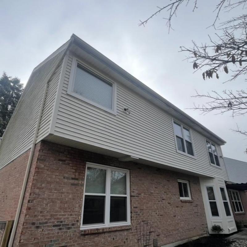 Seamless aluminum gutters with Shur Flo guards installed