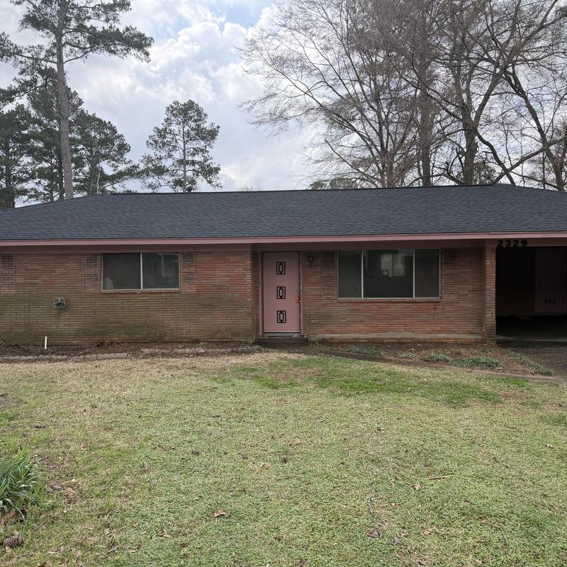 Brick exterior chemical washed for paint prep