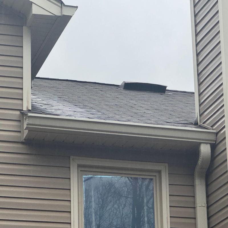 Asphalt shingle roof with vent and gutter system Asphalt shingle roof with vent and gutter system