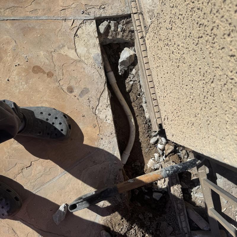 Three-quarter inch pool waterline in ground trench