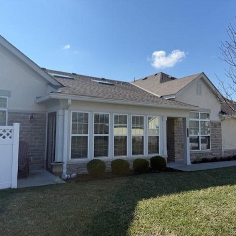 Roof shingles, gutters, and siding inspection exterior view Roof shingles, gutters, and siding inspection exterior view