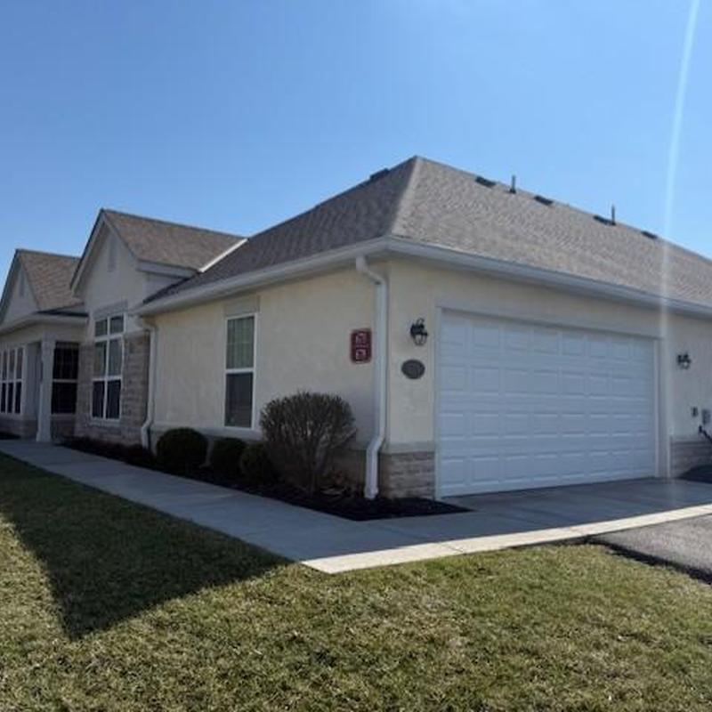 Roof shingles inspection on residential home exterior Roof shingles inspection on residential home exterior