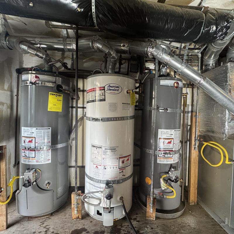 Multi-unit gas water heater system with proper venting