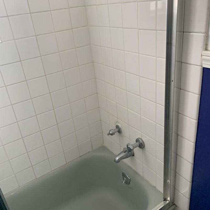 Shower valve and faucet with tiled wall and tub