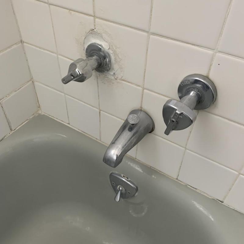 Shower valve and copper pipe installation in tiled wall