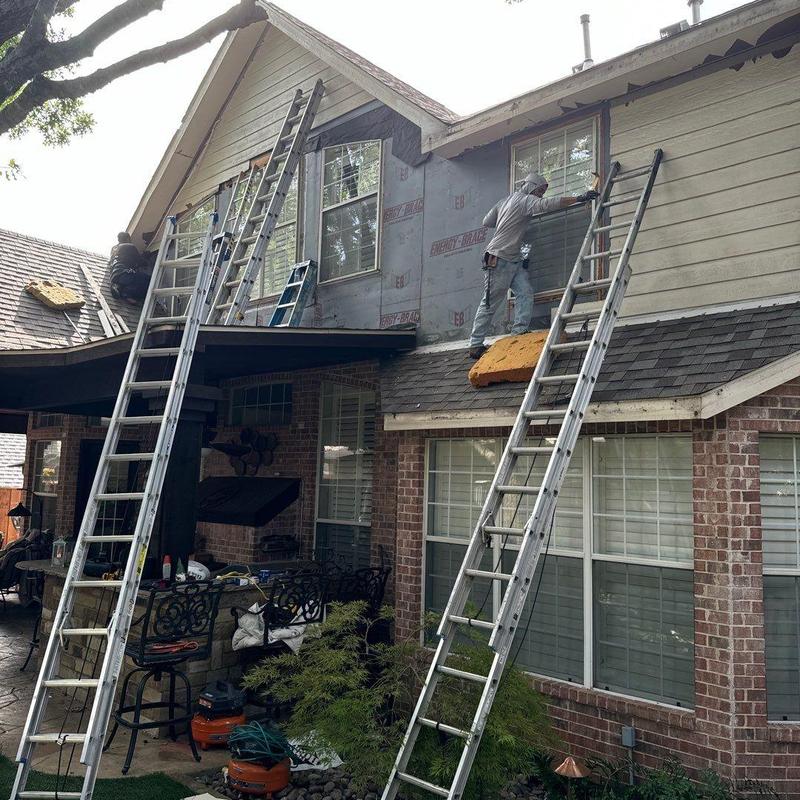 LP SmartSide siding and trim installation on house exterior