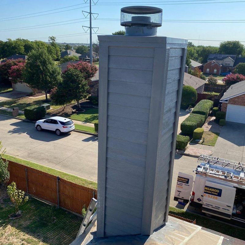 Chimney chase with new LP SmartSide siding and trim Chimney chase with new LP SmartSide siding and trim