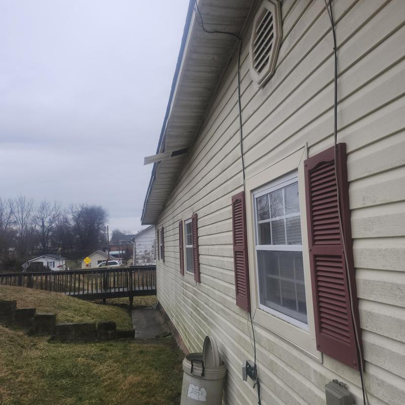 Vinyl soffit and siding on residential house exterior