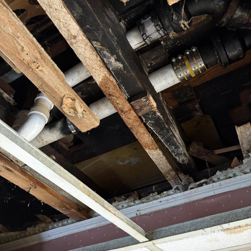 Cast-iron tub drain replaced with PVC pipe system