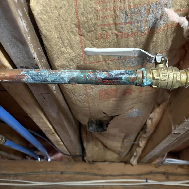 Copper pipe with ball valve and corrosion buildup