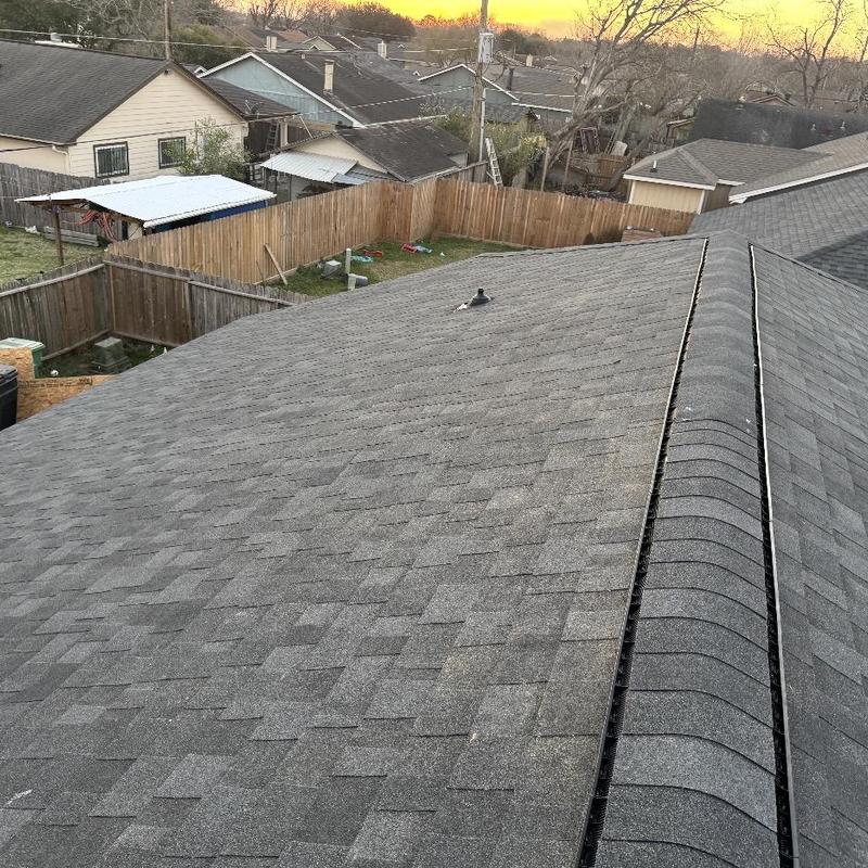 Owens Corning shingles with ridge vent installation on roof