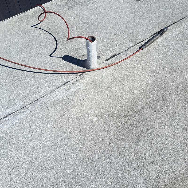 Roof vent with hydrojet sewer cleaning hose