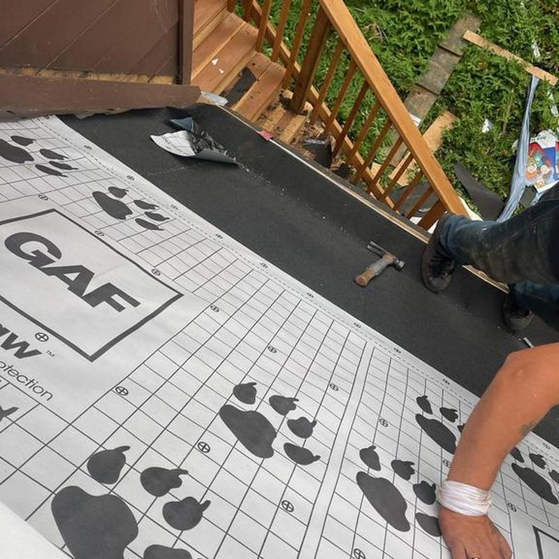 Roof underlayment installation on residential flat roof