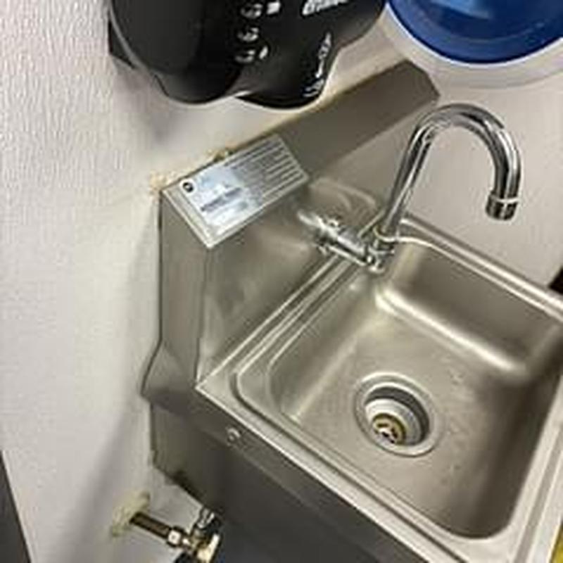 Sink tubular drain fitting and sensor recalibration