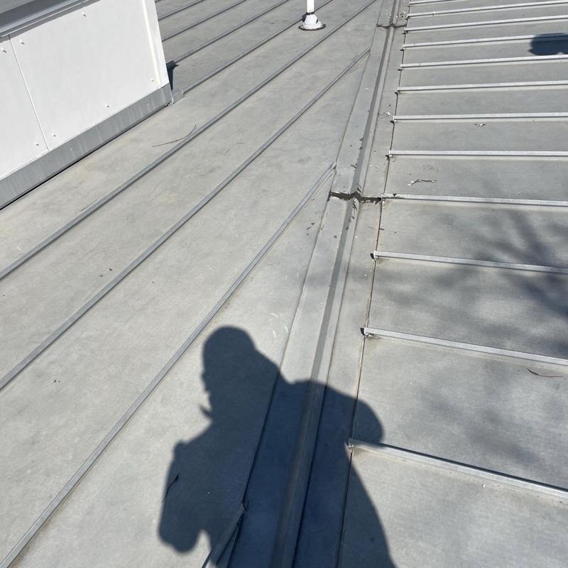 Standing seam metal roof valley and flashing sealant