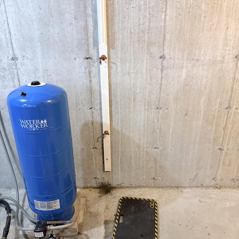 Water Worker pressure tank installed in basement wall