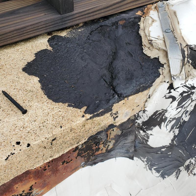 Flat roof membrane with hail and wind damage