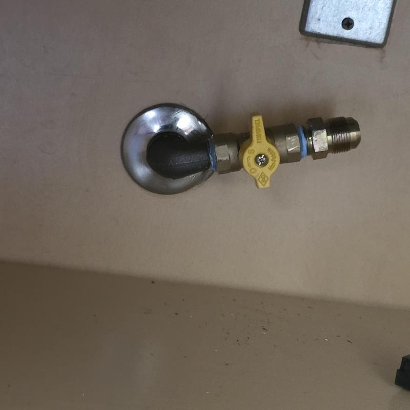 Cooktop gas valve with yellow handle installation