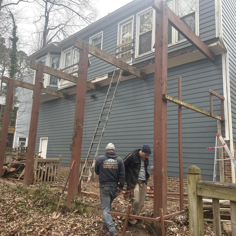 Deck frame demolition and sunroom construction in progress Deck frame demolition and sunroom construction in progress