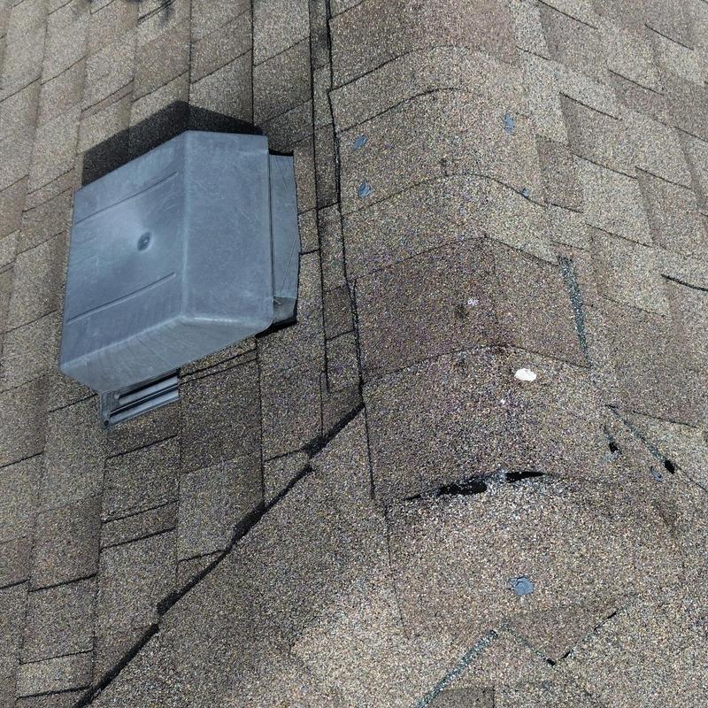 Roof shingles with damaged and missing granules