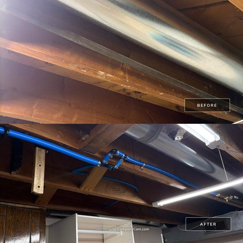 Blue PEX water supply line installation in ceiling beams