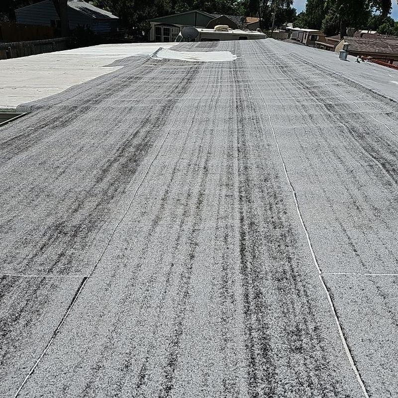 Flat roof membrane with hail damage and leaks Flat roof membrane with hail damage and leaks