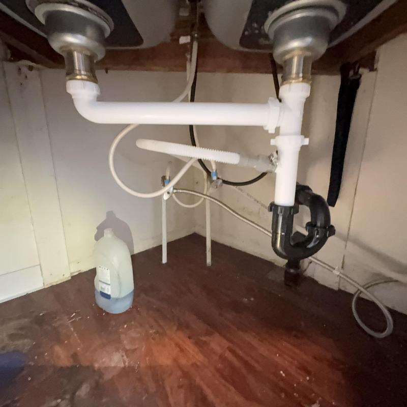 Kitchen drain pipes with new AAV and P-trap installed