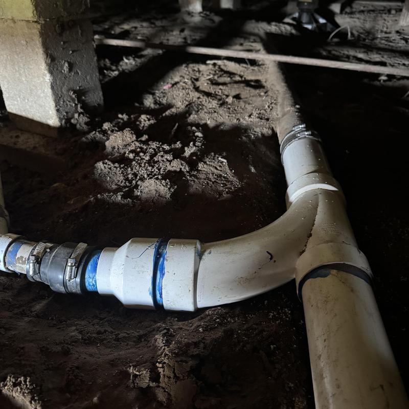 Cast iron to PVC sewer line under pier beam home