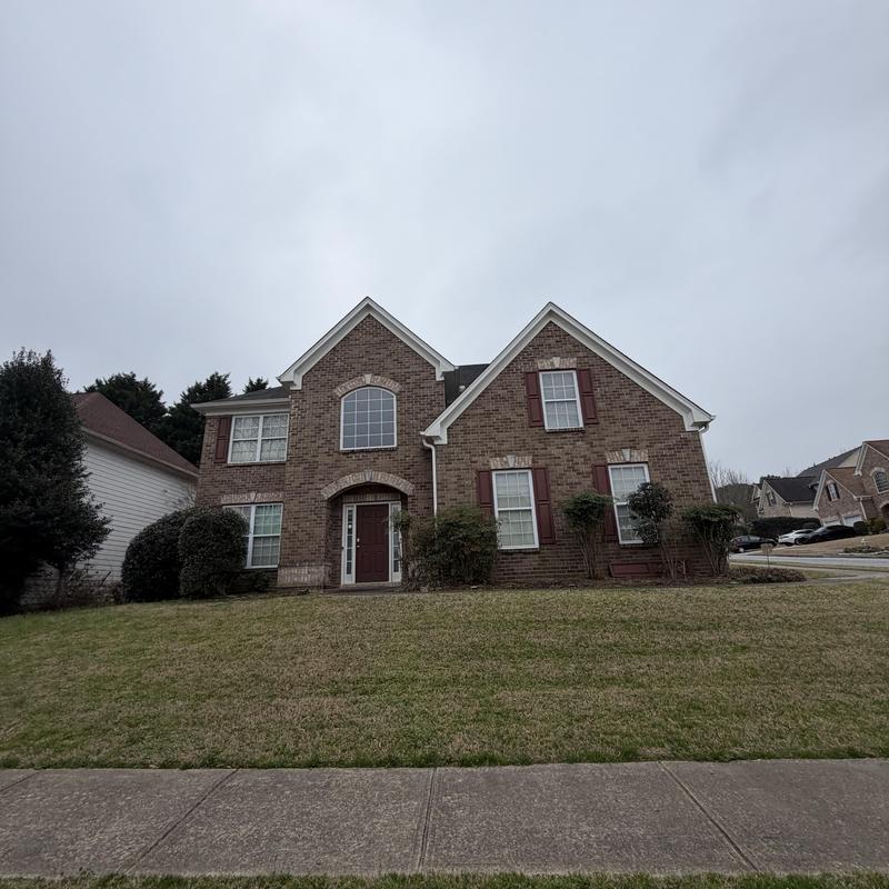 Roof shingles and pipe boot with small tarp installed
