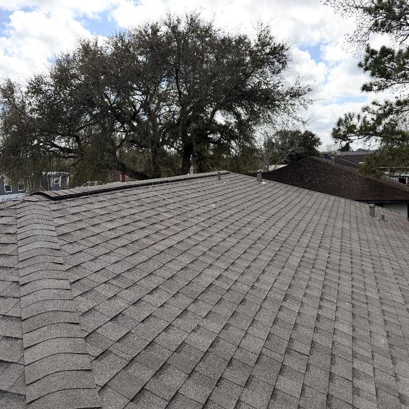 Asphalt shingle roofing with ridge cap installation