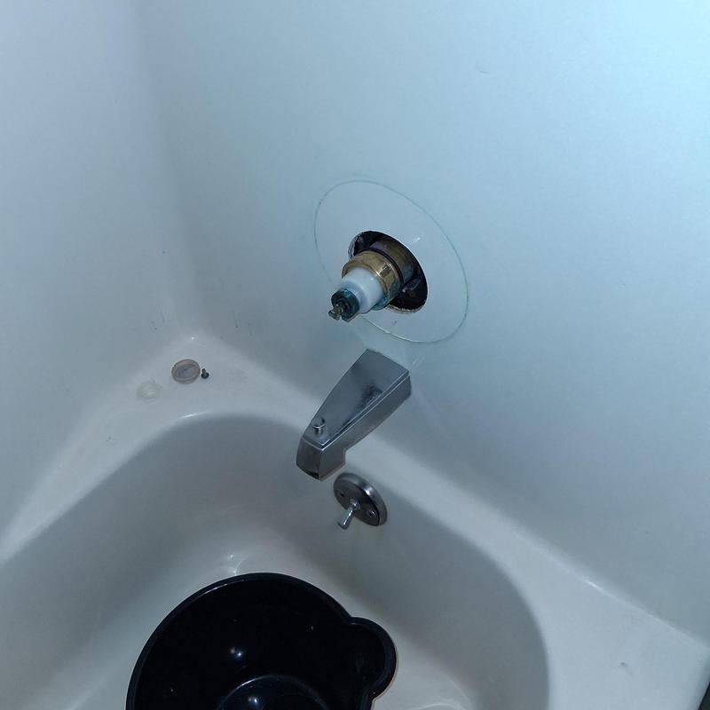 Shower valve installation with tub spout in bathtub
