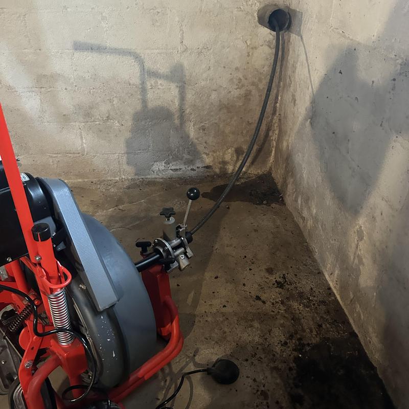 Main line sewer camera inspection in basement corner