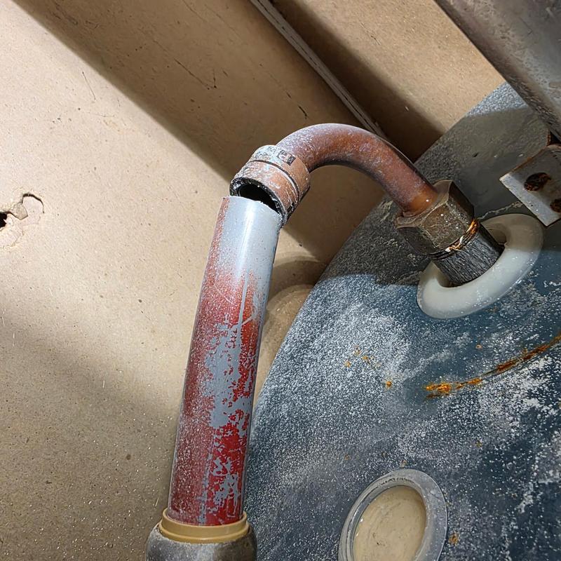 Water heater pipe burst with corroded joint and copper fitting