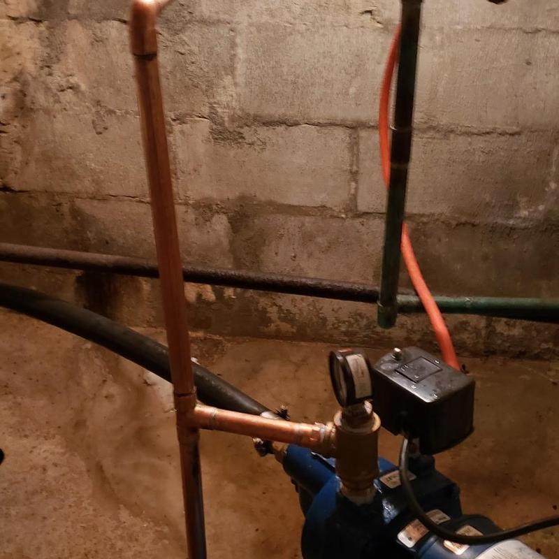 Shallow well pump with pressure switch and copper piping