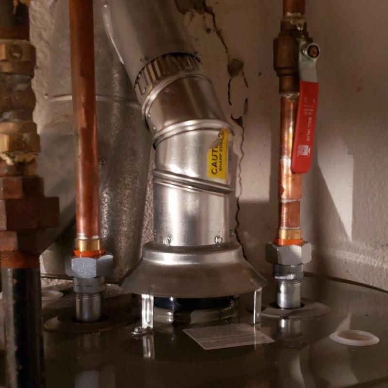 Gas water heater with new ball valve installation