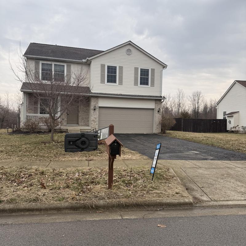 Asphalt shingle roof on two-story house Asphalt shingle roof on two-story house