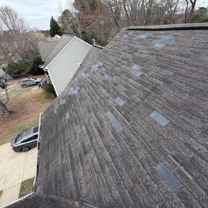 3-tab asphalt shingles with multiple replacement patches