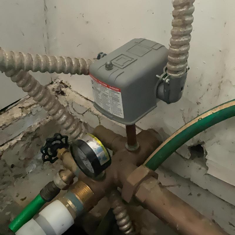 Pressure switch installation on boiler system in basement