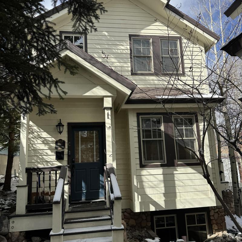 Asphalt shingle roof on multi-unit building exterior Asphalt shingle roof on multi-unit building exterior